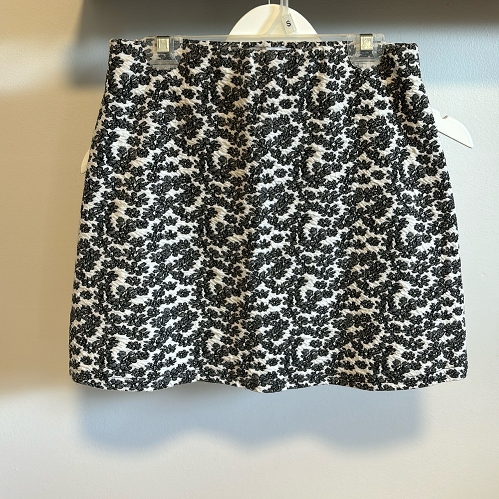 Urban Outfitters textured floral mini skirt.